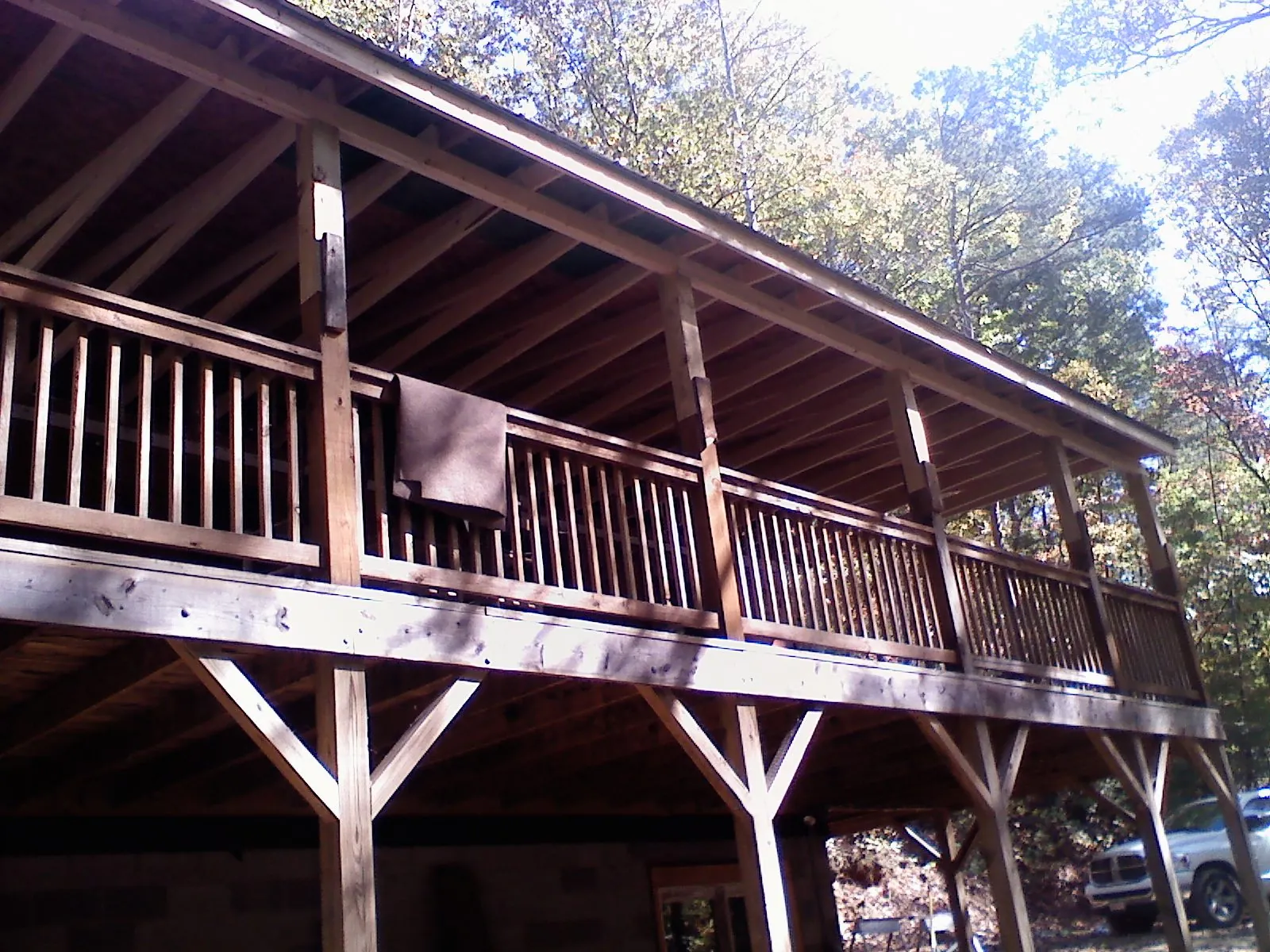 Timber framing under a new elevated porch and deck — Roof Leak Repair in Buckner by Roofing Brothers